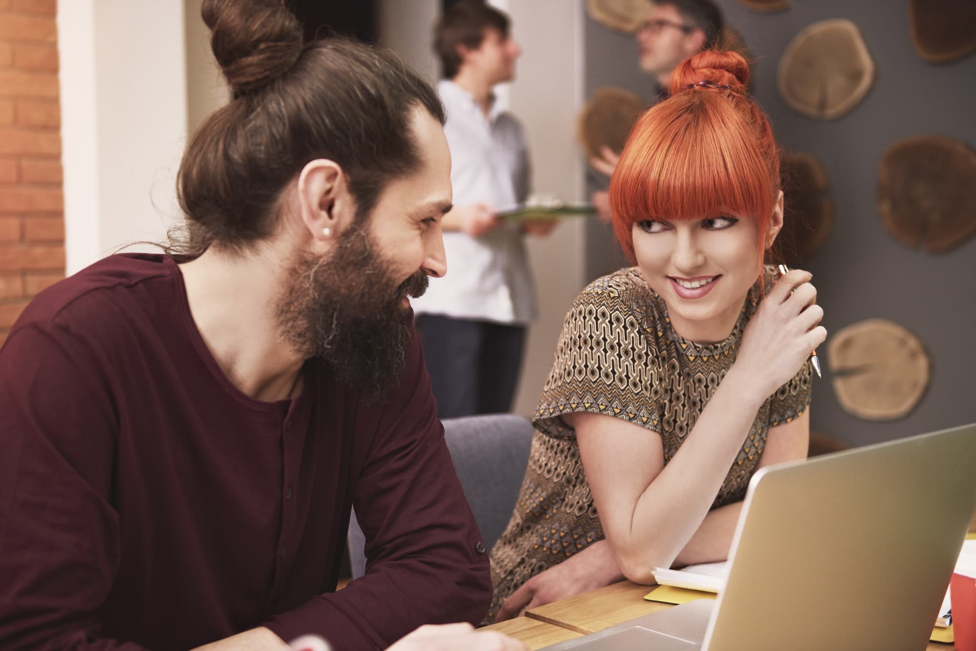 Talking with coworker at the office