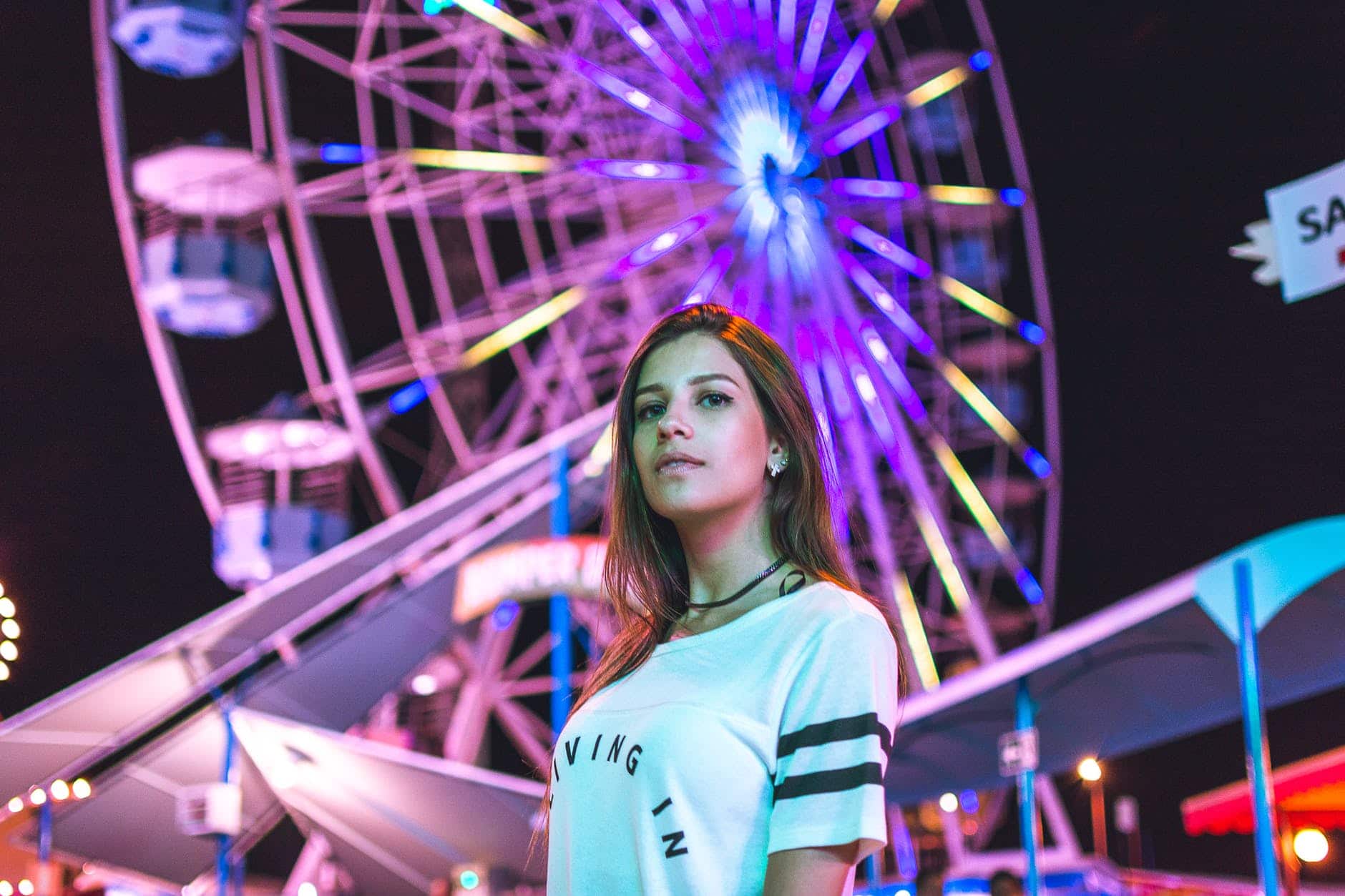low angle photography of female on carnival