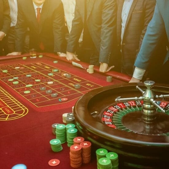 group people roulette gambling table luxury casino