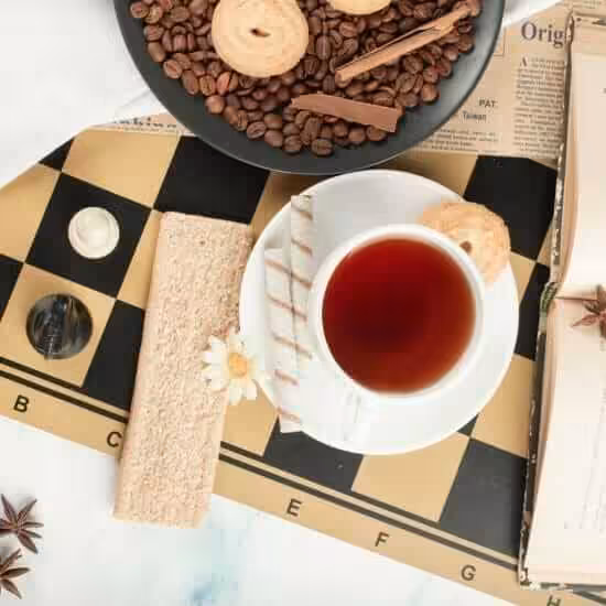 tea cup book chessboard