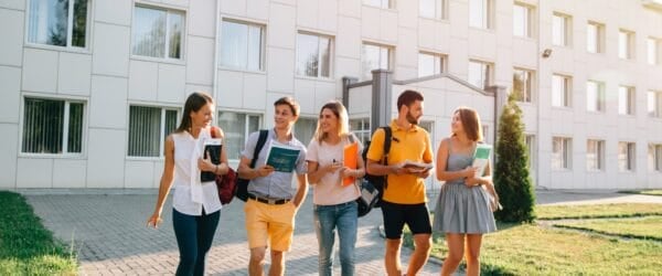free time students bachelor s campus life rhythm five friendly students are walking