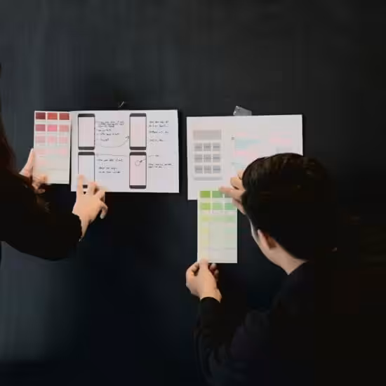 Designers collaborating on user interface mockups