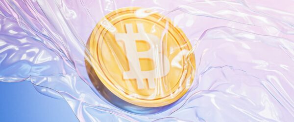 Bitcoin coin floating in liquid
