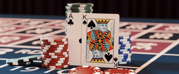 a casino table with poker chips and playing cards